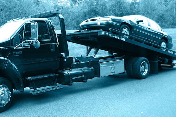 Donated car being towed away