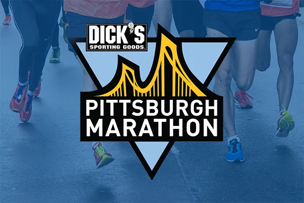 Runners with Pittsburgh Marathon Logo